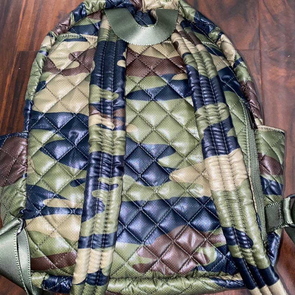 24 + 7 small tablet backpack. Worn once!